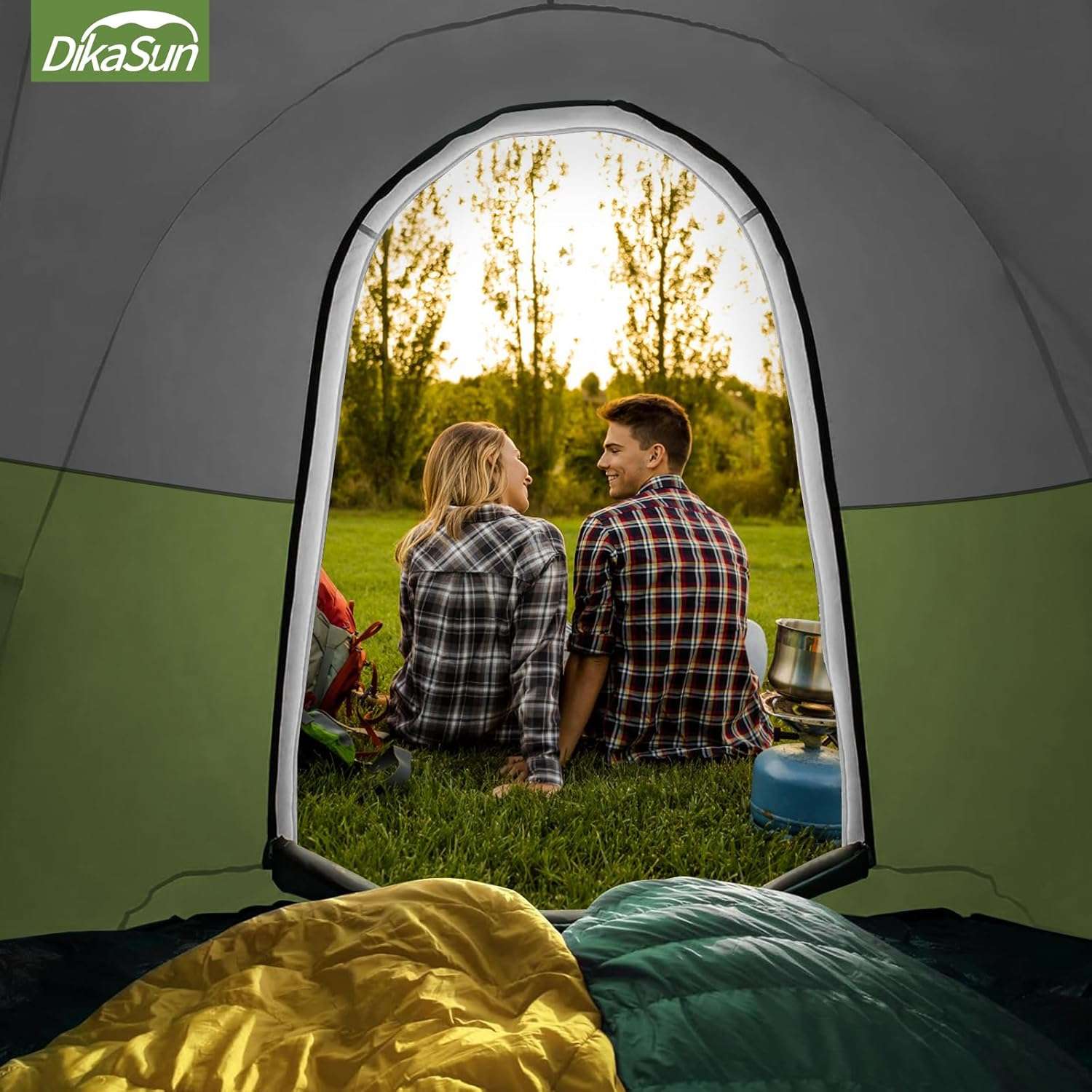 Dikasun pickup truck bed tent 5.5-6.7ft awning green, couple at tent opening on grass on Tampa Home & Garden Store