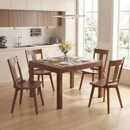 Solid wood dining chairs set of 4 with curved backs in a modern kitchen dining area on Tampa Home & Garden Store