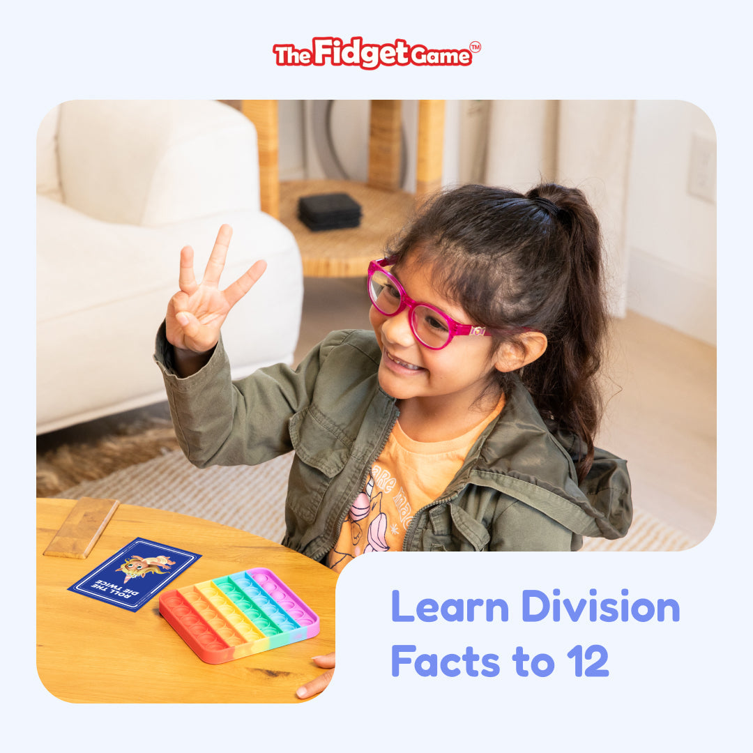 Division Card Pack educational toy by The Fidget Games; rainbow pop-it tray with card on a table on Tampa Home & Garden Store