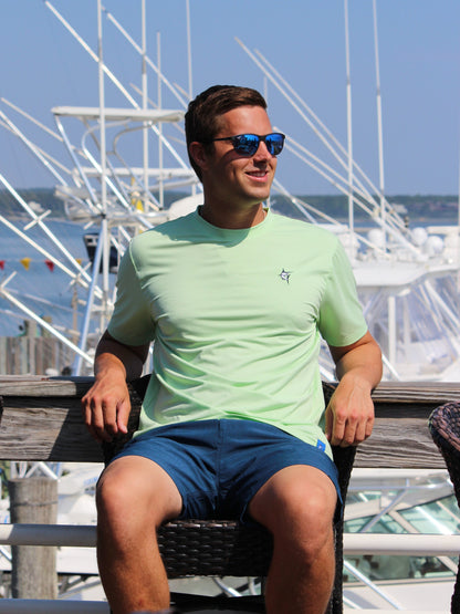 Dockside Performance Tee mint short-sleeve by White Water Life with logo at marina on Tampa Home & Garden Store