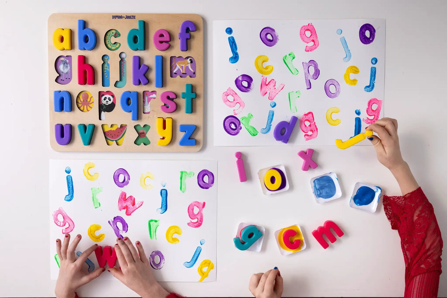 Domino & Juliette Find & Fit Puzzle: wooden board with bright letters and animal cutouts on Tampa Home & Garden Store