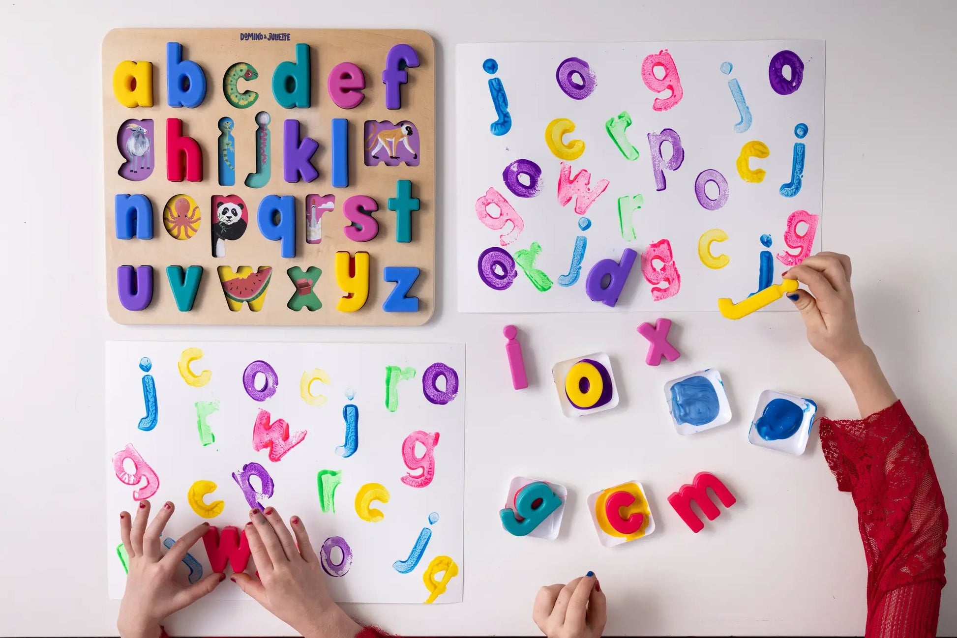 Domino & Juliette Find & Fit Puzzle: wooden board with bright letters and animal cutouts on Tampa Home & Garden Store