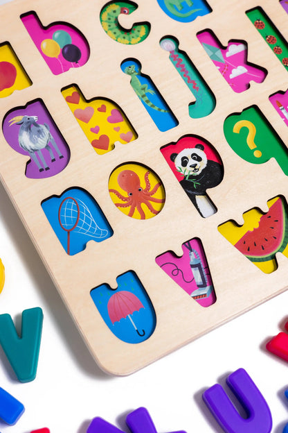 xyz Find & Fit Puzzle by Domino & Juliette on a wooden board with colorful animal shapes on Tampa Home & Garden Store