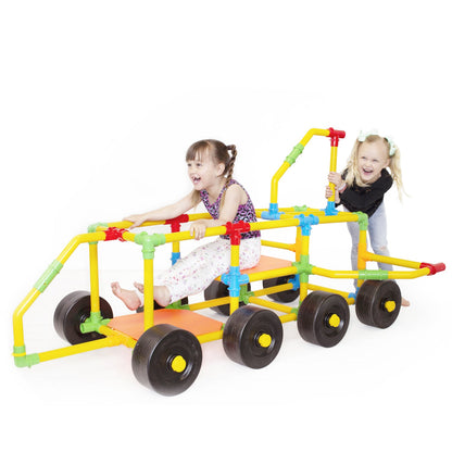 TubeLox Deluxe STEM construction set with colorful modular tubes and wheels, two children playing on the frame on Tampa Home & Garden Store
