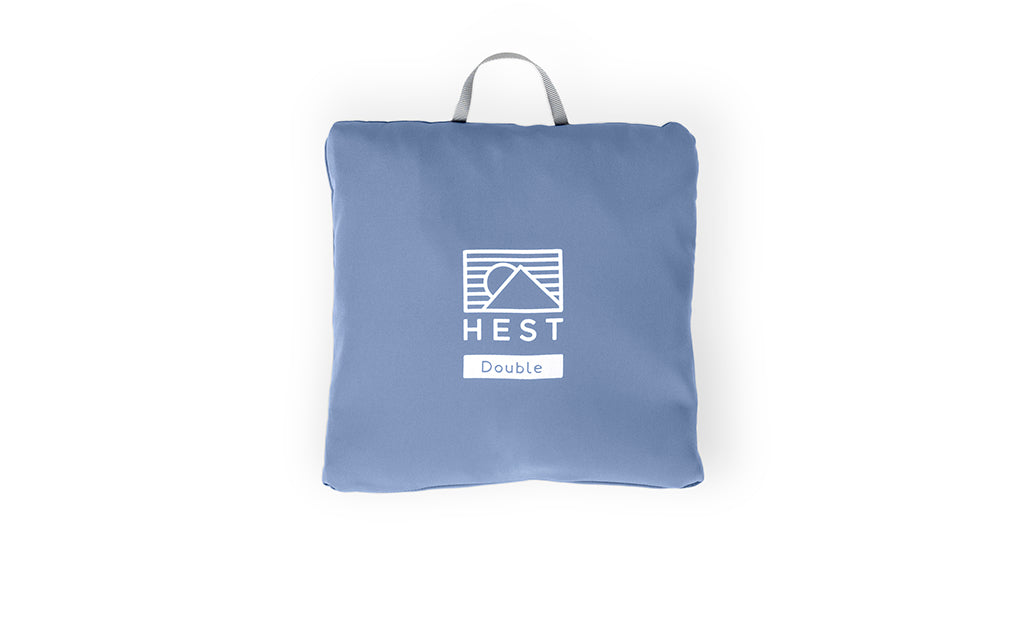 Top Sheet blue pouch with HEST logo and Double label on Tampa Home & Garden Store