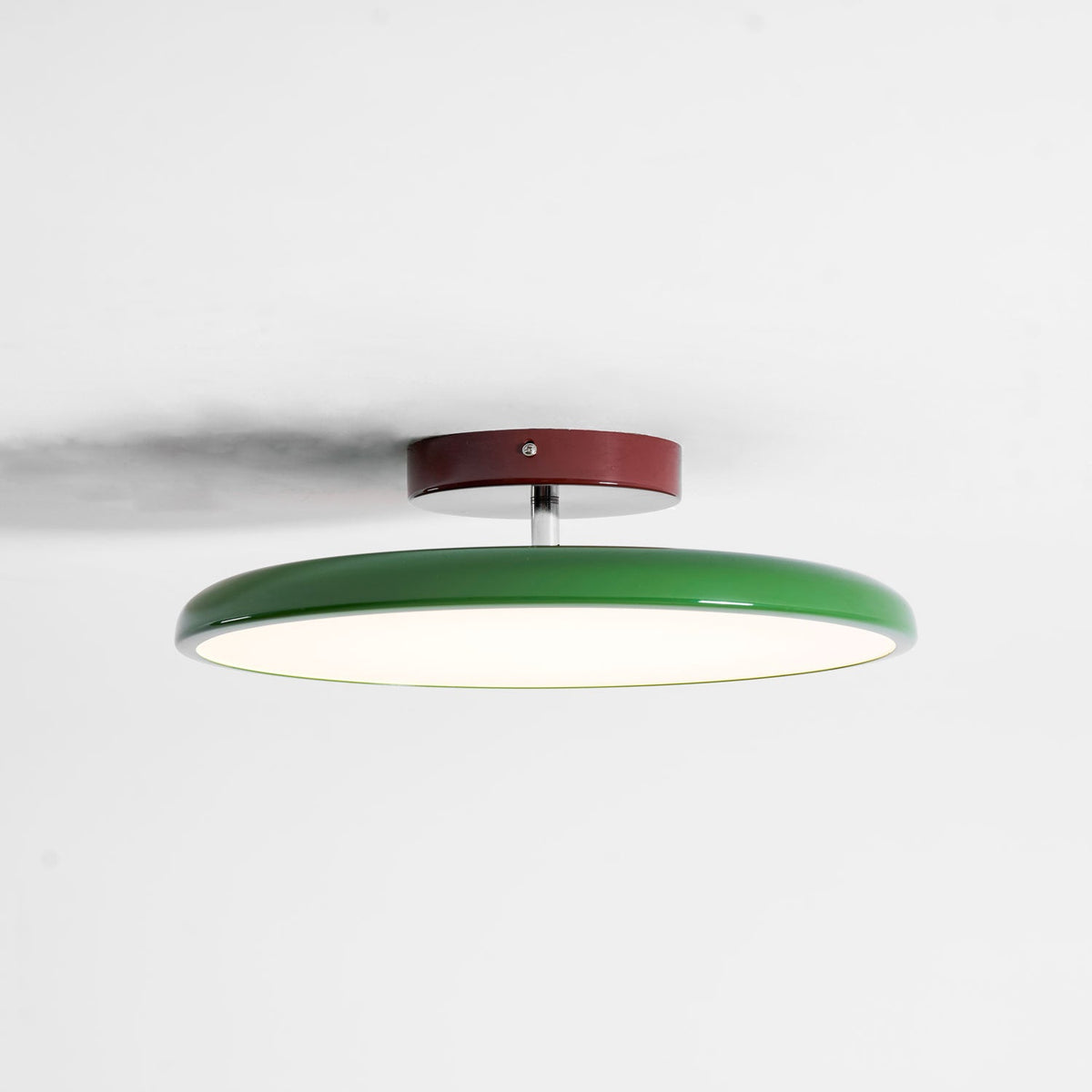 Orbitra flush mount LED ceiling light with green ring, white diffuser, red canopy Moktan Sabai on Tampa Home & Garden Store