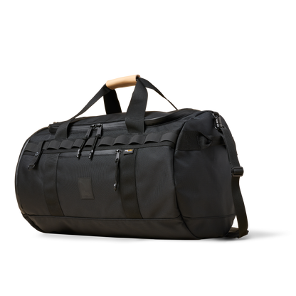 Duffalo duffel bag black with tan top handle and MOLLE webbing The Brown Buffalo on Tampa Home & Garden Store