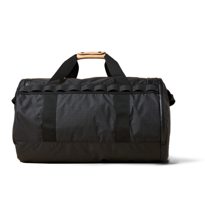 Duffalo duffel bag dark gray grid fabric with beige leather top handle and black straps on Tampa Home & Garden Store