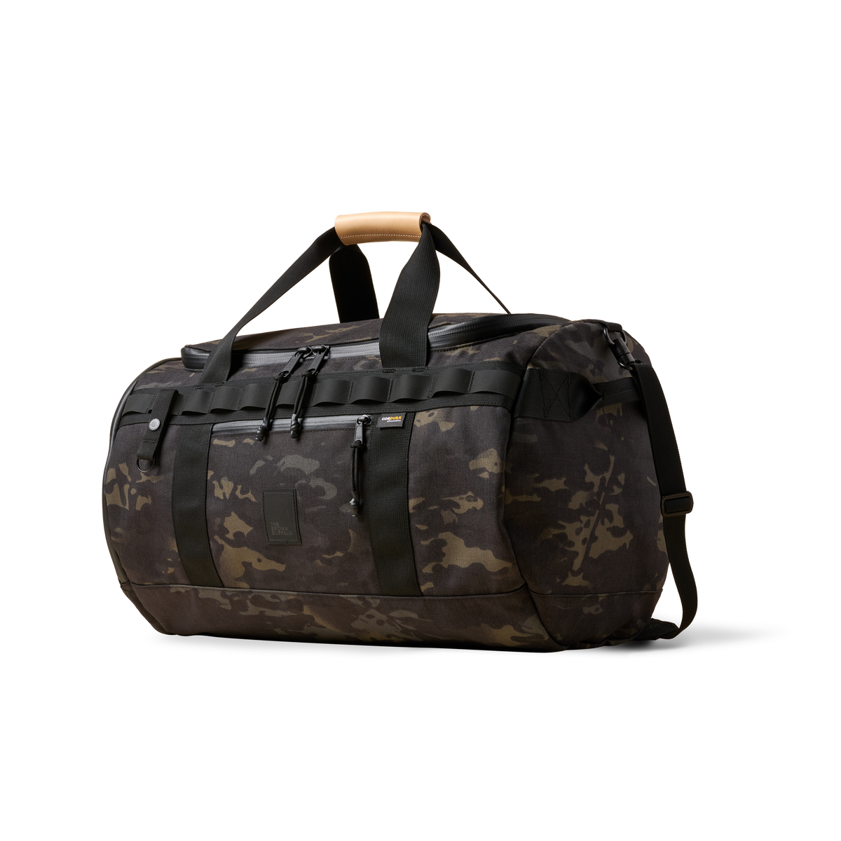 Duffalo camouflage duffel bag with black straps and tan leather handle The Brown Buffalo on Tampa Home & Garden Store