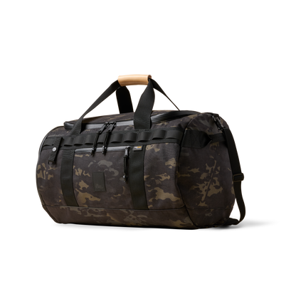 Duffalo camouflage duffel bag with black straps and tan leather handle The Brown Buffalo on Tampa Home & Garden Store