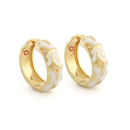 Swirl Tattoo Earrings, pair of gold-tone hoops with white enamel swirl and crystal accents on Tampa Home & Garden Store
