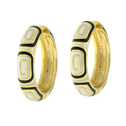 Modern Art Earring two enamel hoop earrings in gold with white and black panels by Lauren G Adams on Tampa Home & Garden Store