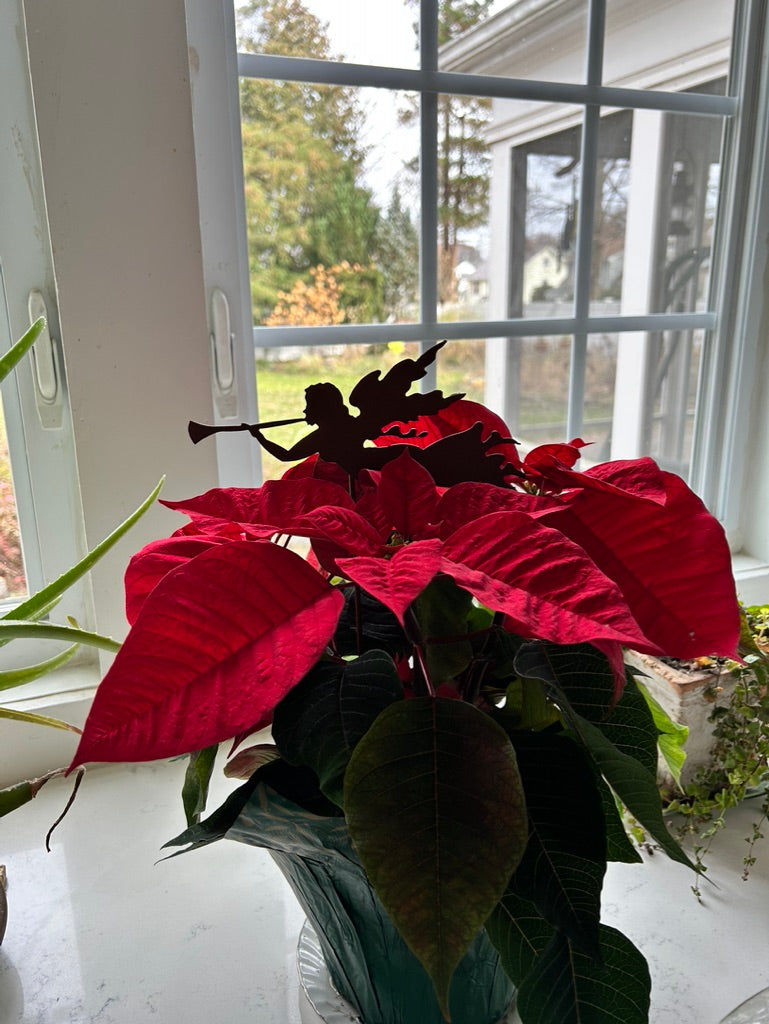 Angel Plant Stake / Angel Memorial with black silhouette atop red poinsettia in green pot on Tampa Home & Garden Store