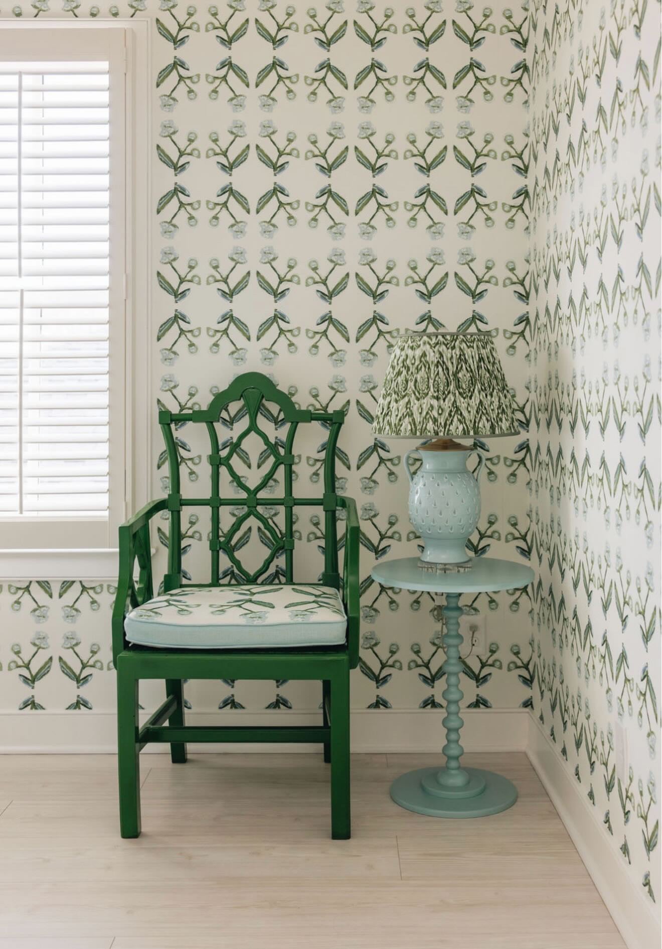 Antonia Wallpaper blue & green repeat pattern on walls with green chair and teal lamp on Tampa Home & Garden Store