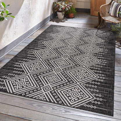 Frankville Black&White Performance Outdoor Rug with geometric pattern on wooden deck on Tampa Home & Garden Store