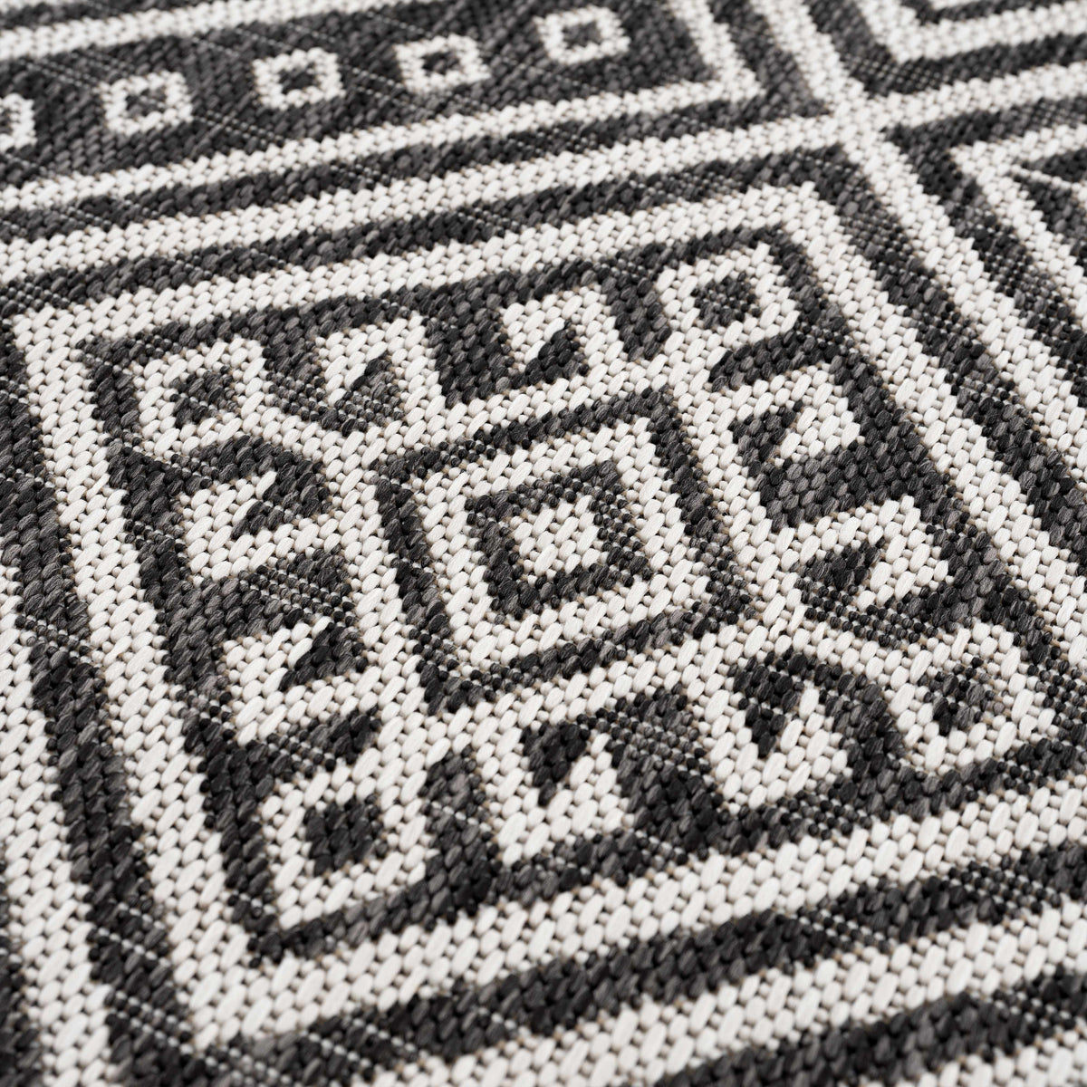Frankville Black&White All Over Performance Outdoor Rug woven pattern Boutique Rugs on Tampa Home & Garden Store
