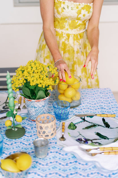 Lemon Posey china plates set with lemon motif on a blue patterned table setting on Tampa Home & Garden Store