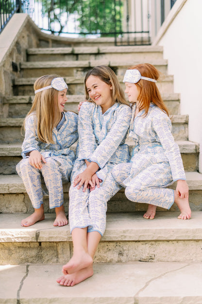 Mini Trellis Pajama blue by Erin Donahue Tice; three girls in matching trellis pajamas on steps on Tampa Home & Garden Store