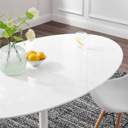 Lippa Oval Wood Dining Table in white finish with lemon centerpiece and glass vase on Tampa Home & Garden Store
