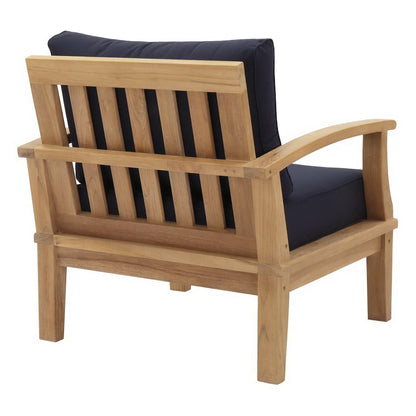 Marina Outdoor Patio Teak Armchair with navy cushion and slatted back in natural wood finish on Tampa Home & Garden Store