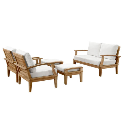 Marina 5-Piece teak outdoor set with white cushions; loveseat, armchairs, coffee table, ottoman on Tampa Home & Garden Store