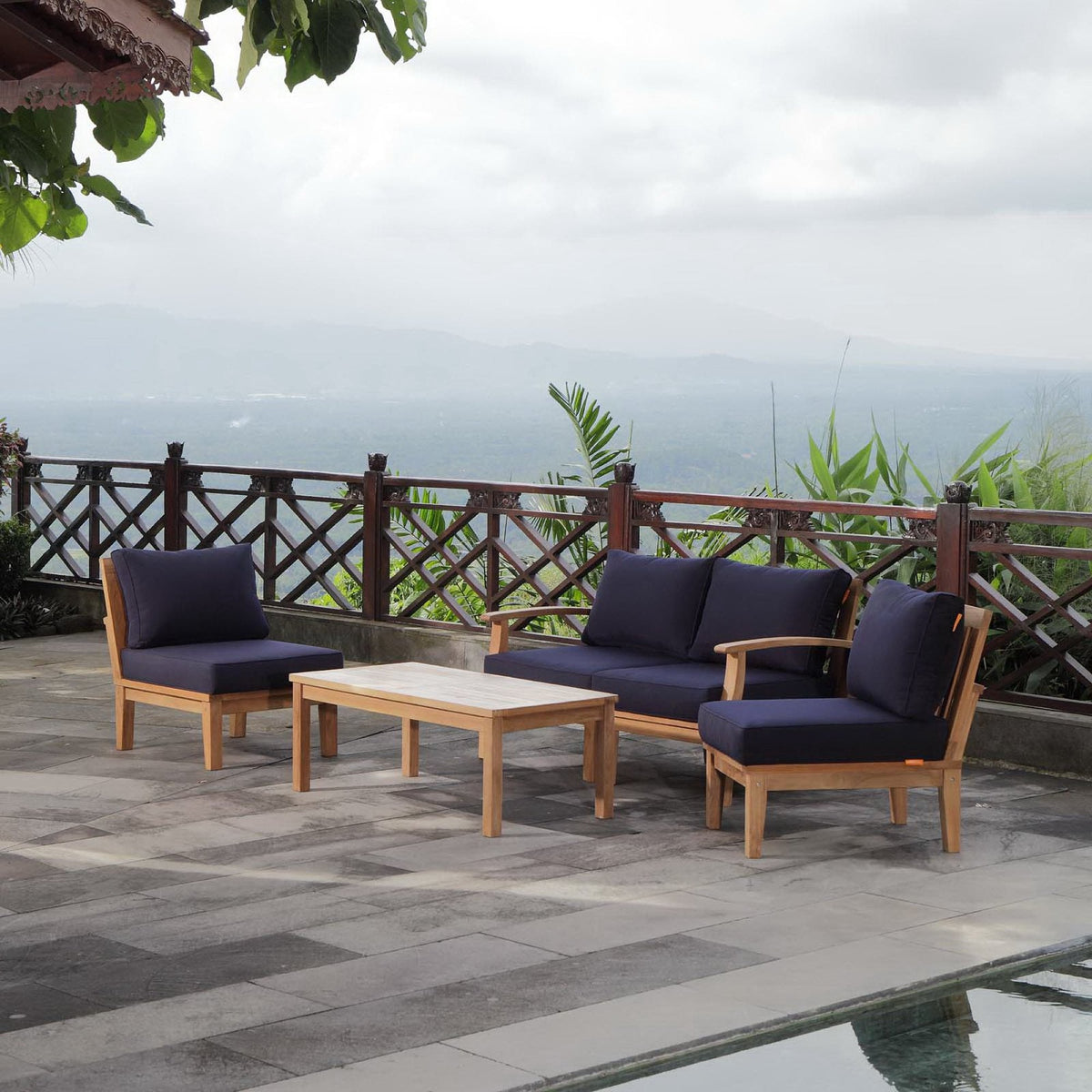Marina 5 Piece Outdoor Patio Teak Set with navy cushions on natural teak frames on Tampa Home & Garden Store