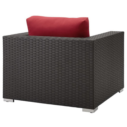 Sojourn outdoor Sunbrella armchair with dark brown wicker frame and red cushion on Tampa Home & Garden Store