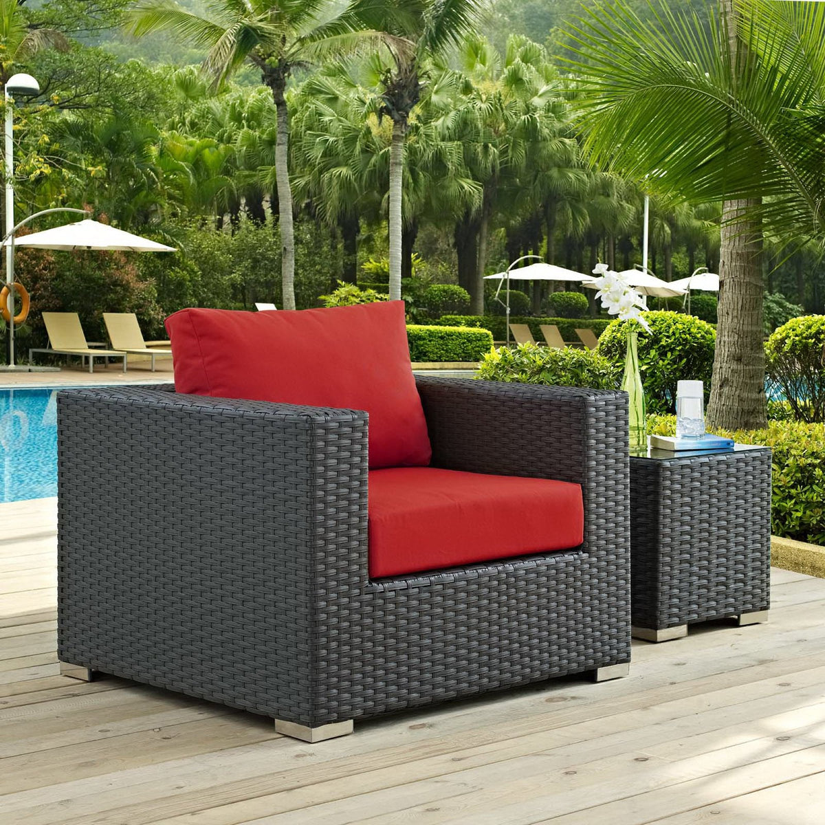 Sojourn Outdoor Sunbrella Armchairs by Modway in dark wicker with red cushions by the pool on Tampa Home & Garden Store