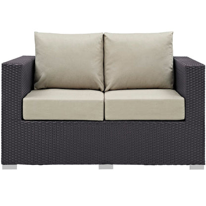 Convene outdoor patio loveseat with beige cushions and dark wicker frame on Tampa Home & Garden Store