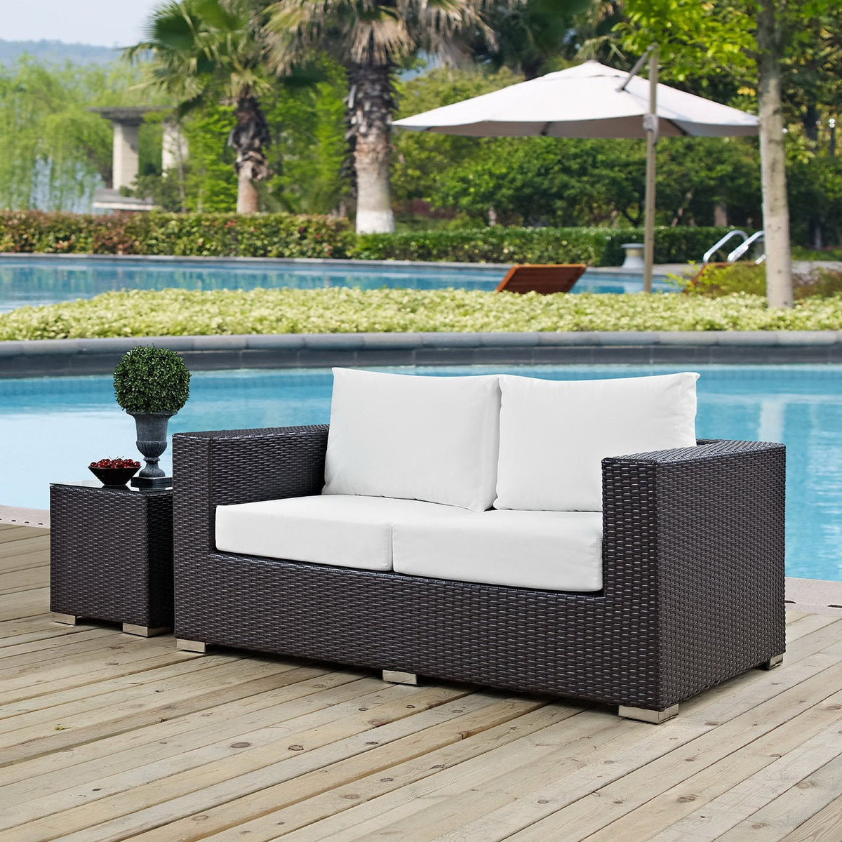 Convene Outdoor Patio Loveseat by Modway with dark wicker and white cushions poolside on Tampa Home & Garden Store