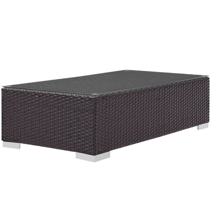 Convene outdoor patio coffee table in dark brown woven rattan with glass top and metal legs on Tampa Home & Garden Store