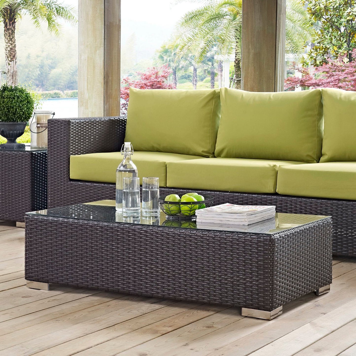 Convene outdoor patio coffee table with glass top and brown wicker base on Tampa Home & Garden Store