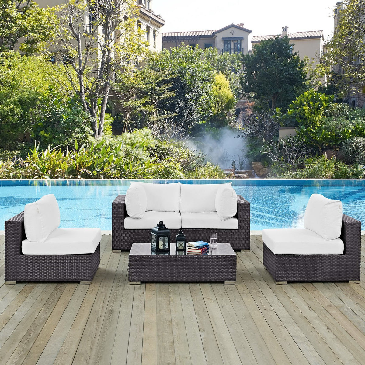 Convene 5 Piece Outdoor Patio Sectional Set in dark brown wicker with white cushions by a pool on Tampa Home & Garden Store