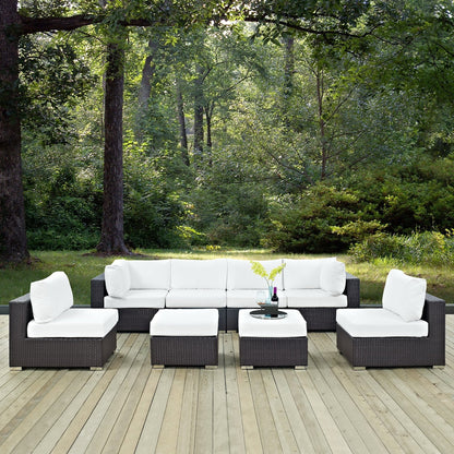 Convene 8 Piece Sectional Set with white cushions and dark wicker frames on a deck on Tampa Home & Garden Store