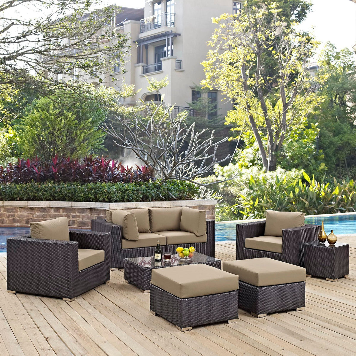 Convene 8 Piece Outdoor Patio Sectional Set with dark wicker frames and beige cushions on Tampa Home & Garden Store