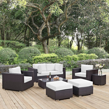 Convene 8 Piece Outdoor Patio Sectional Set with dark wicker frames and white cushions on a wooden deck on Tampa Home & Garden Store