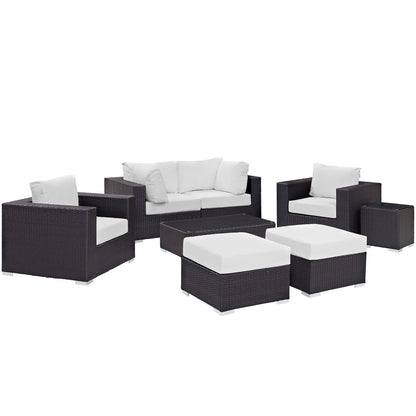 Convene 8 piece outdoor sectional in dark brown wicker with white cushions and coffee table on Tampa Home & Garden Store