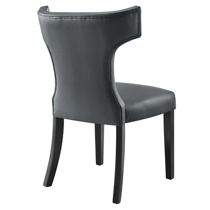 Curve vegan leather dining chair with black upholstery and curved back on Tampa Home & Garden Store