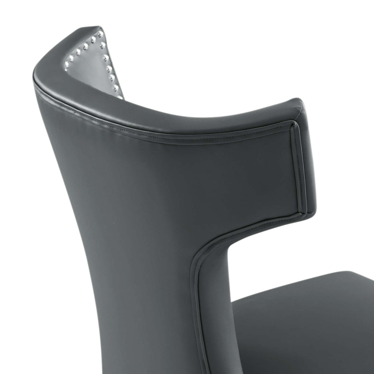 Curve vegan leather dining chair in dark gray with nailhead trim on Tampa Home & Garden Store