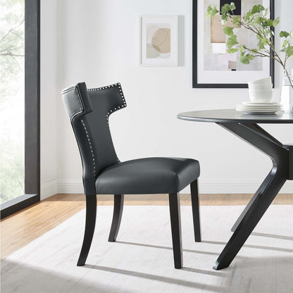 Curve vegan leather dining chair by Modway, black with nailhead trim in a modern dining setting on Tampa Home & Garden Store