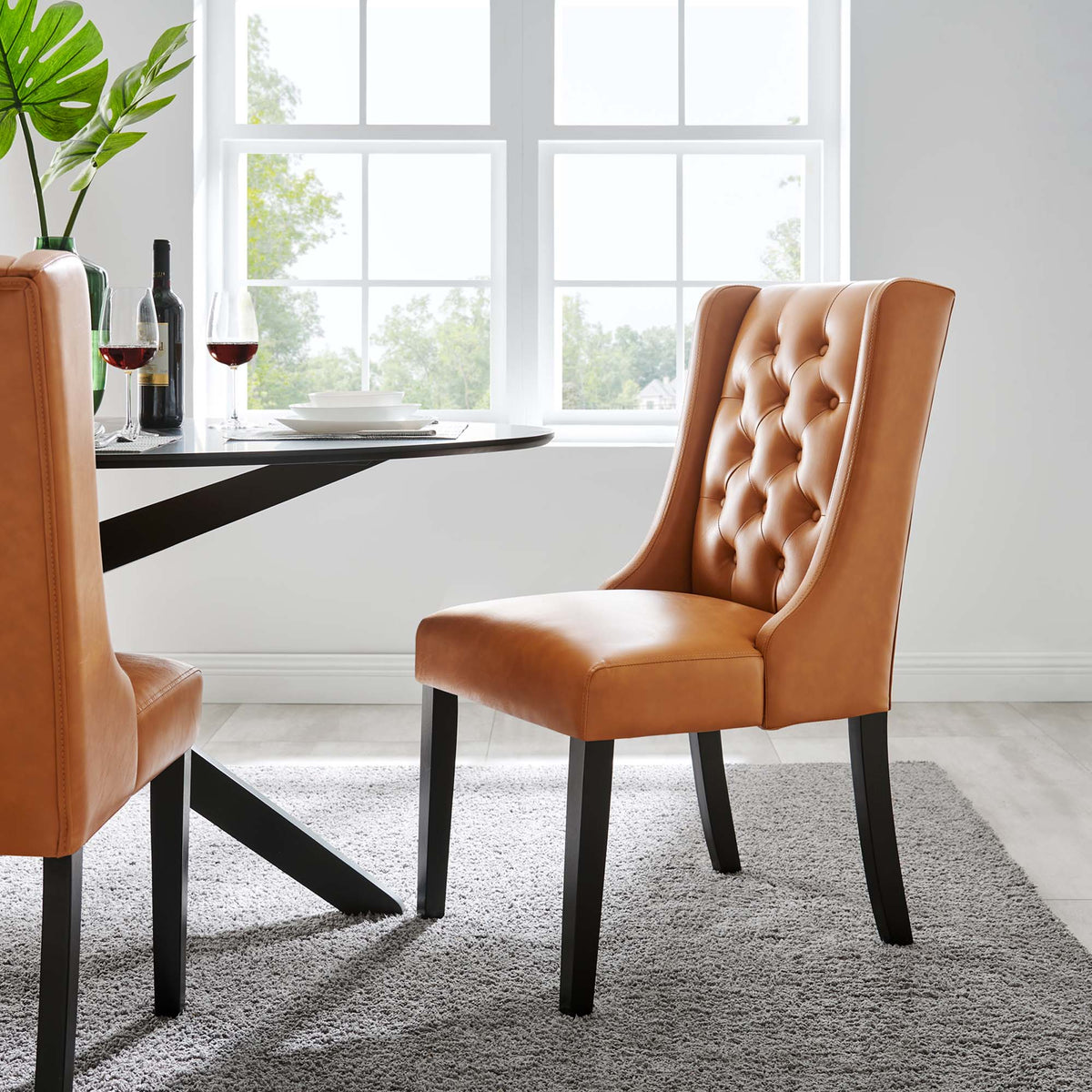 Baronet Button Tufted Vegan Leather Dining Chairs pair in tan with black legs on Tampa Home & Garden Store
