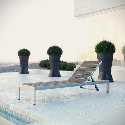 Shore Outdoor Aluminum Chaise with gray frame and brown slatted seat on Tampa Home & Garden Store