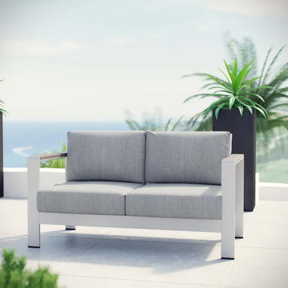 Shore Outdoor Patio Aluminum Loveseat with gray cushions on a white aluminum frame on Tampa Home & Garden Store