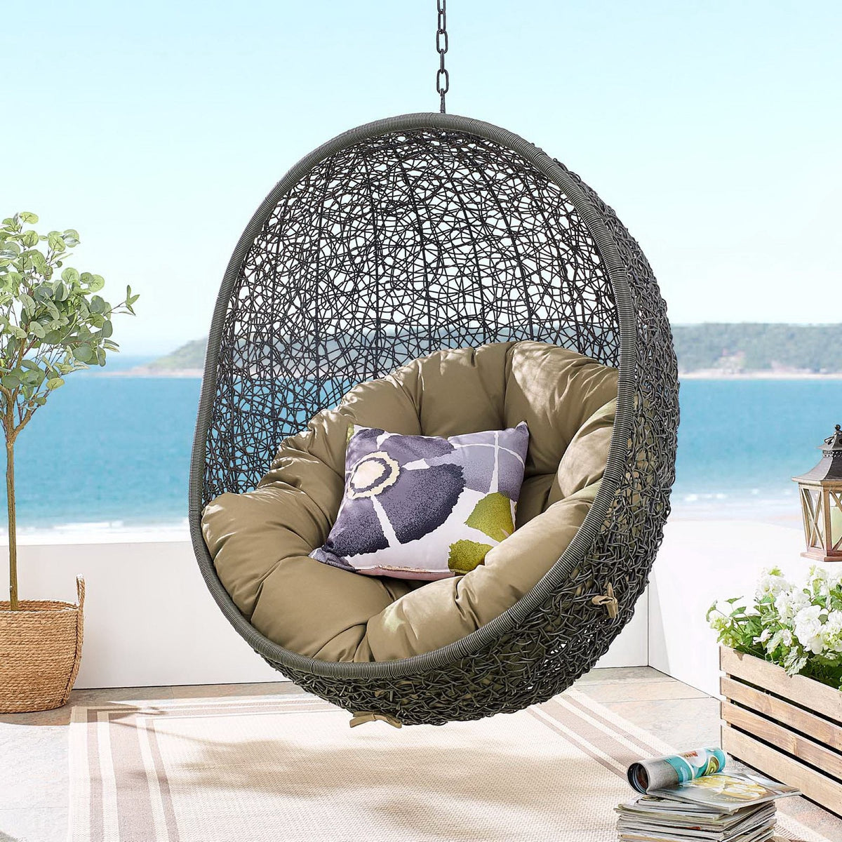 Hide outdoor patio swing chair with stand hanging wicker daybed with beige cushions on Tampa Home & Garden Store