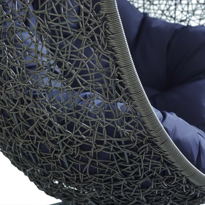 Hide Patio Swing Chair With Stand closeup of gray woven rattan frame and navy cushions on Tampa Home & Garden Store
