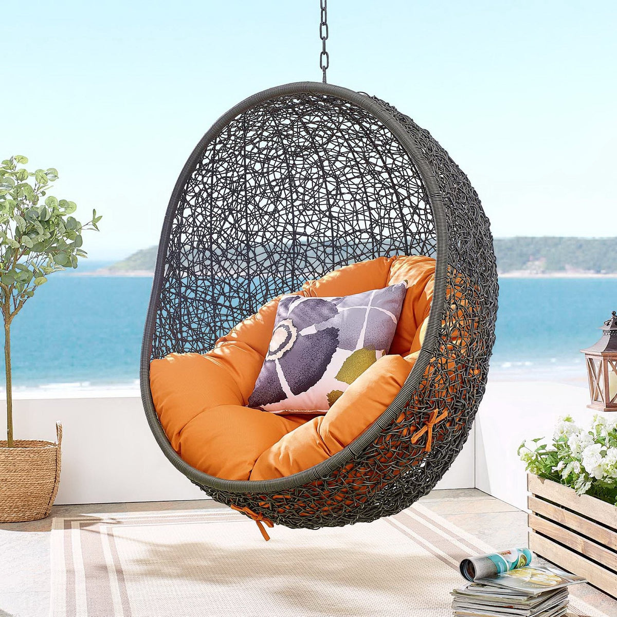 Hide Outdoor Patio Swing Chair by Modway, dark wicker hanging egg chair with orange cushions on Tampa Home & Garden Store