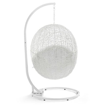 White spherical outdoor hanging daybed chair on curved metal stand with chain on Tampa Home & Garden Store