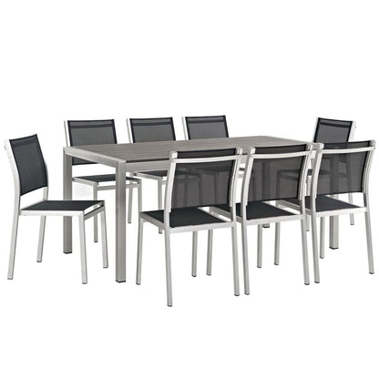 Shore 9-piece outdoor patio aluminum dining set with silver frame and black mesh chairs on Tampa Home & Garden Store