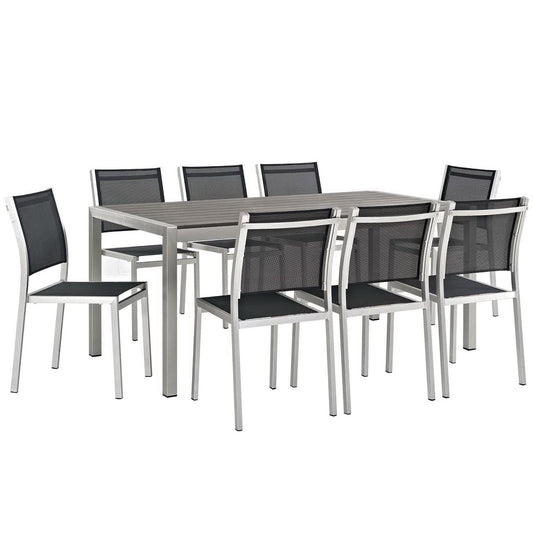 Shore 9-piece outdoor patio aluminum dining set with silver frame and black mesh chairs on Tampa Home & Garden Store