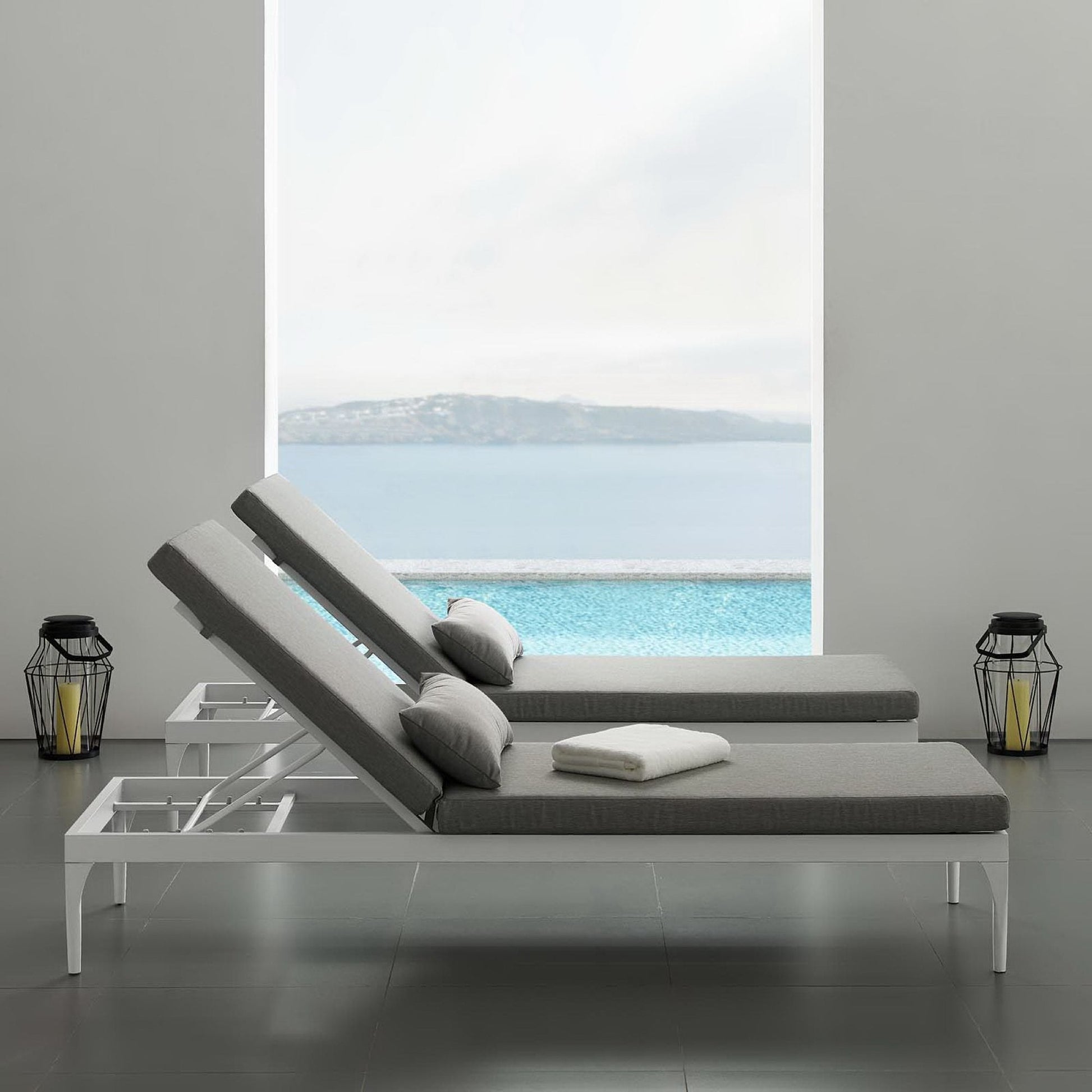 Outdoor chaise lounge chairs with gray cushions and white frames, 3-piece set, seaside view on Tampa Home & Garden Store